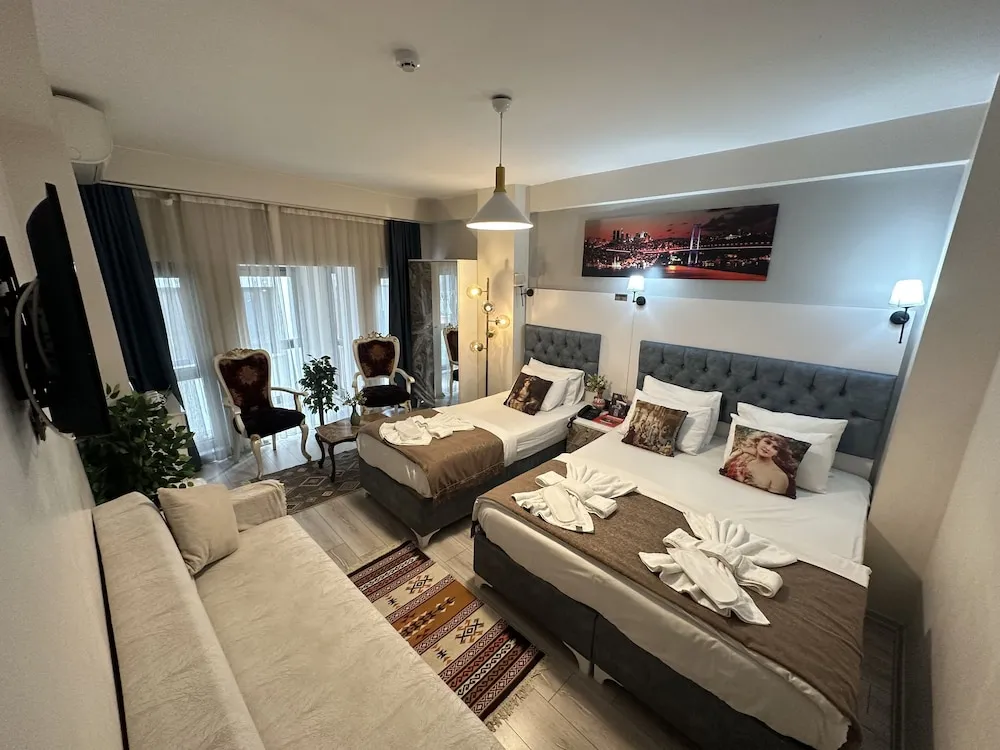 Deluxe Üç Kişilik Oda