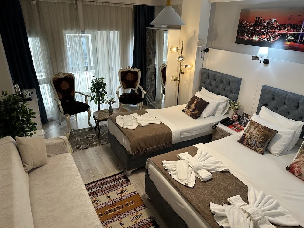 Deluxe Üç Kişilik Oda