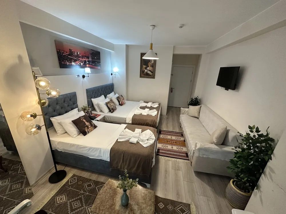Deluxe Üç Kişilik Oda