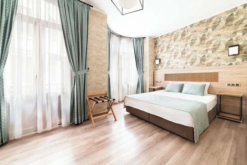Deluxe Tek Büyük veya İki Ayrı Yataklı Oda
