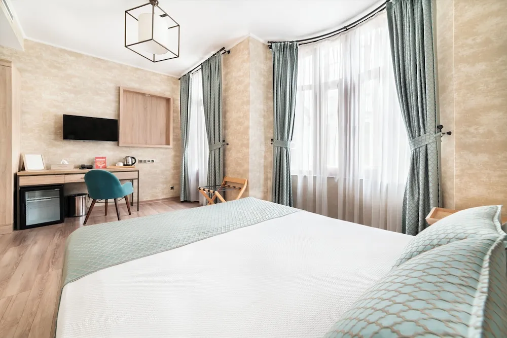 Deluxe Tek Büyük veya İki Ayrı Yataklı Oda
