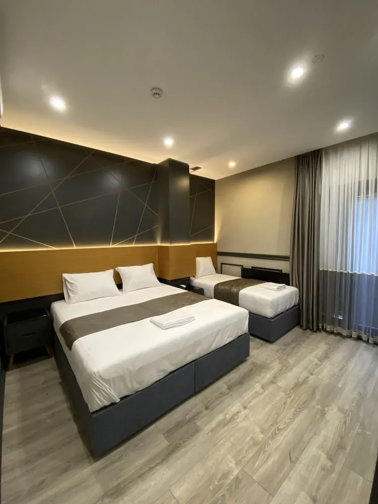 Deluxe Üç Kişilik Oda