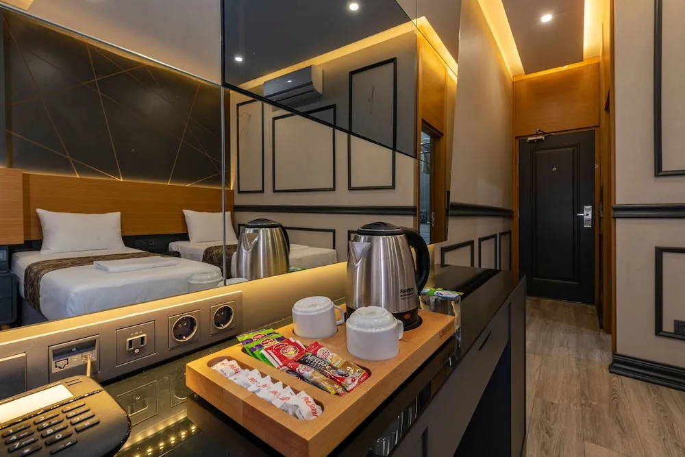 Deluxe Üç Kişilik Oda