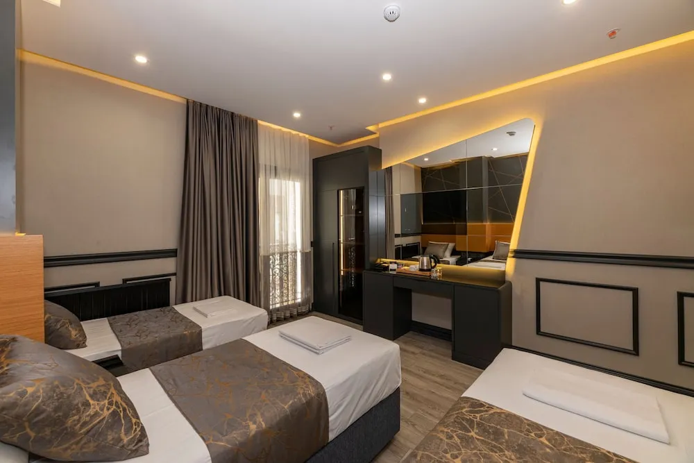 Deluxe Üç Kişilik Oda