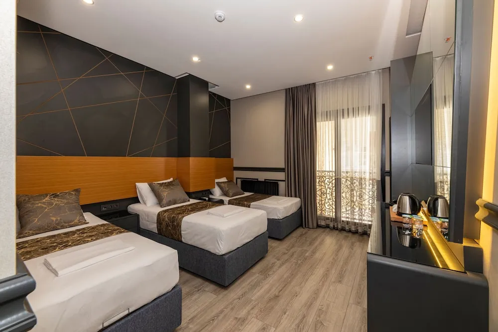 Deluxe Üç Kişilik Oda