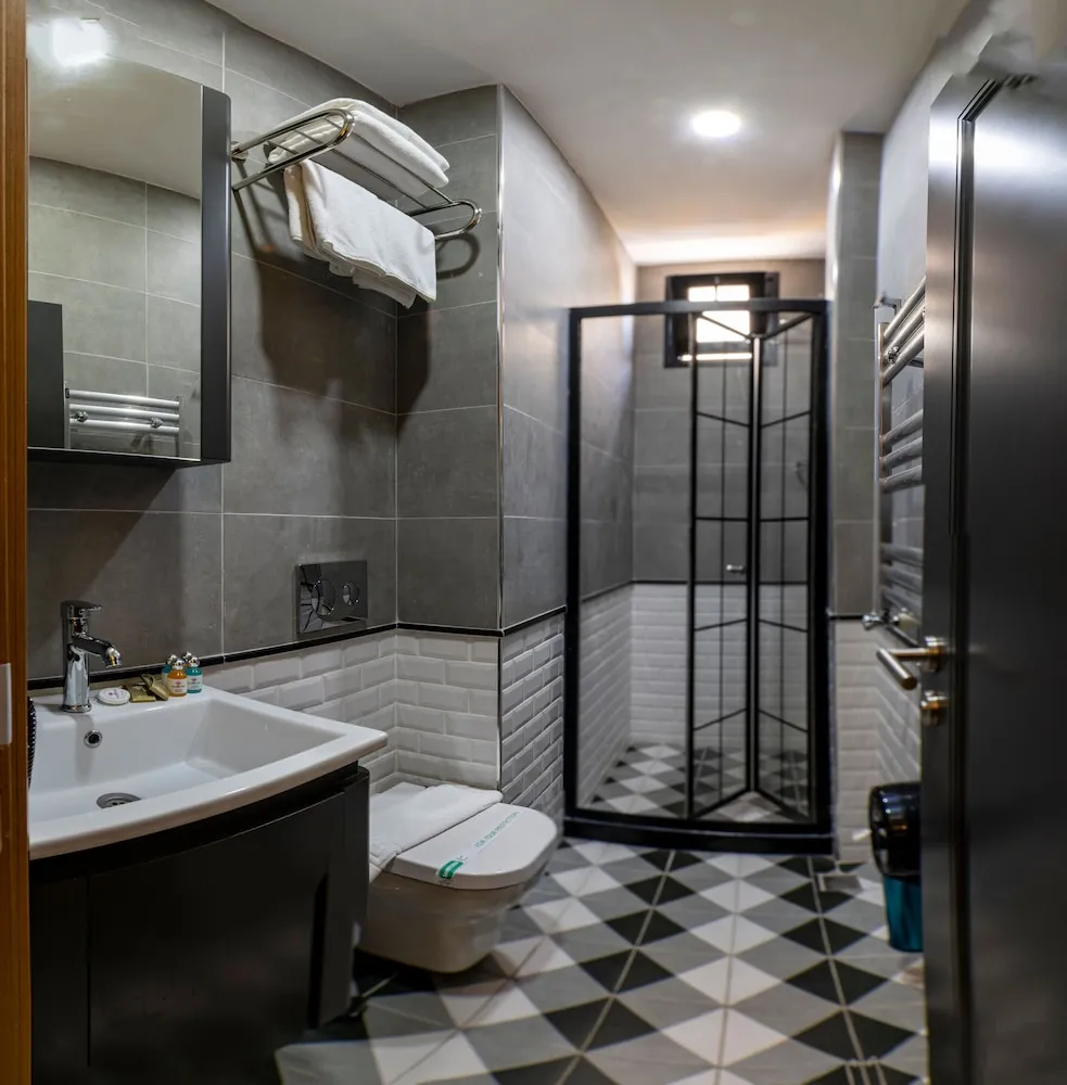 Deluxe Üç Kişilik Oda