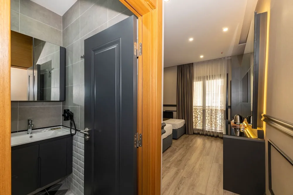 Deluxe Üç Kişilik Oda