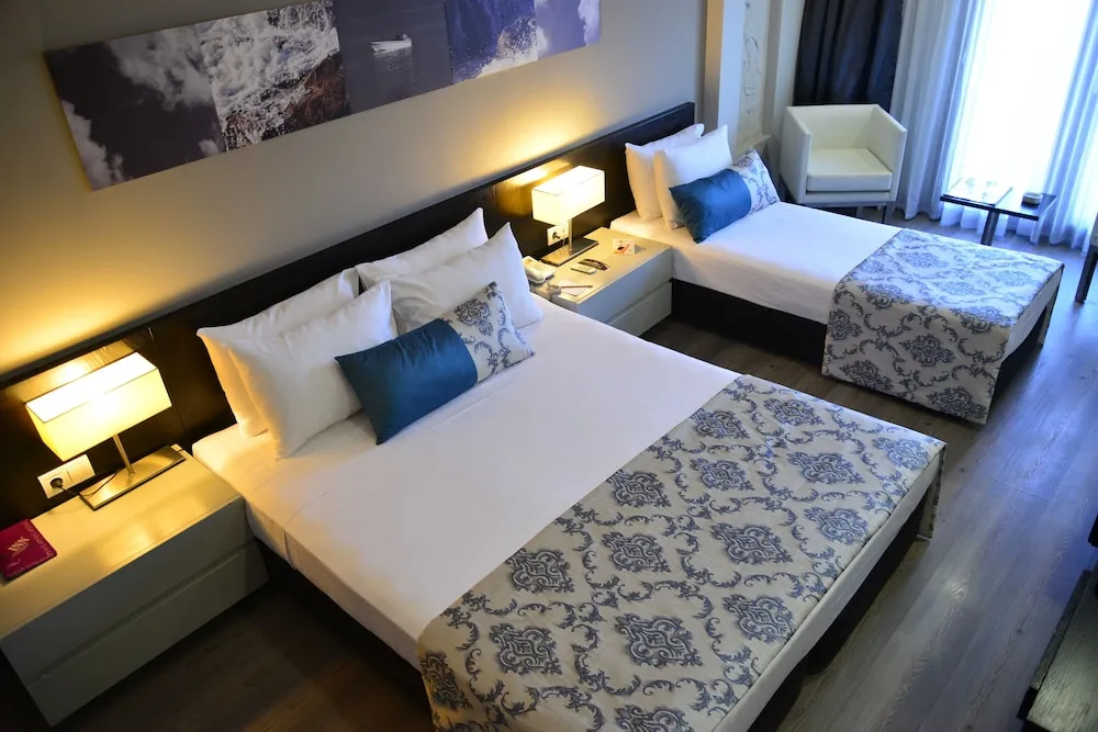 Deluxe Tek Büyük veya İki Ayrı Yataklı Oda