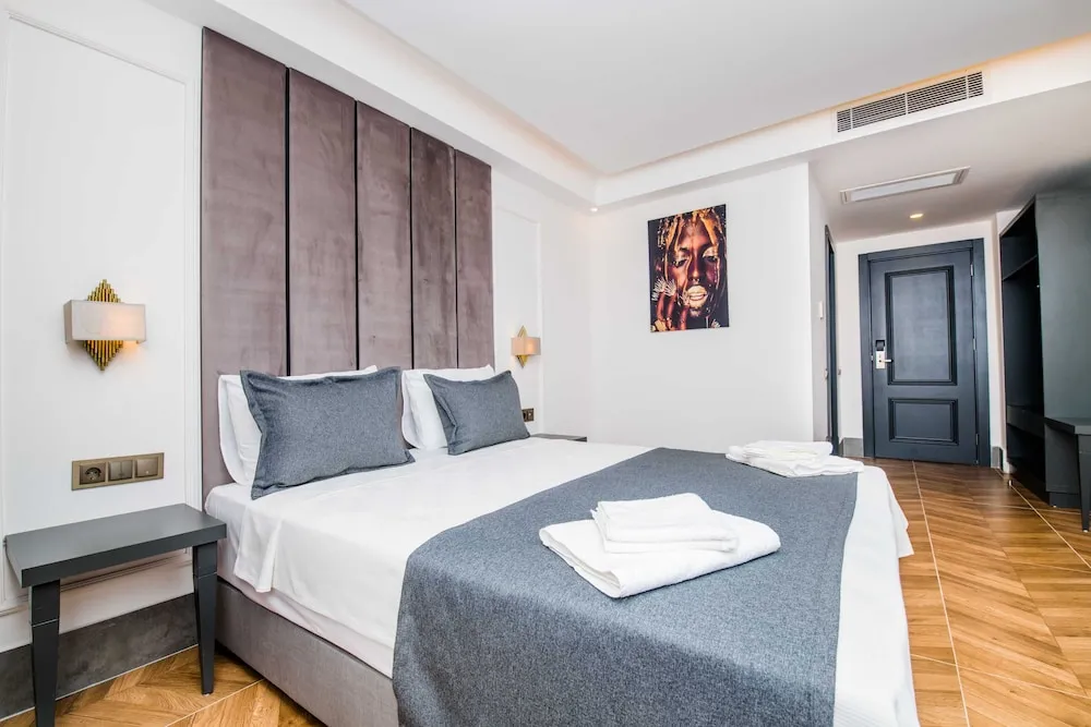 Deluxe Üç Kişilik Oda