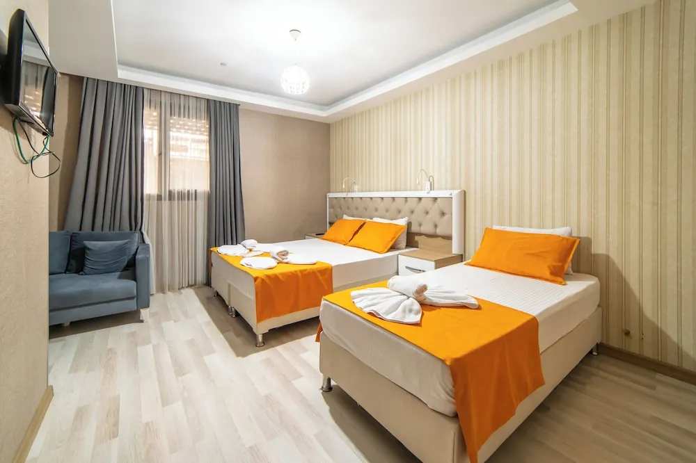 Deluxe Üç Kişilik Oda