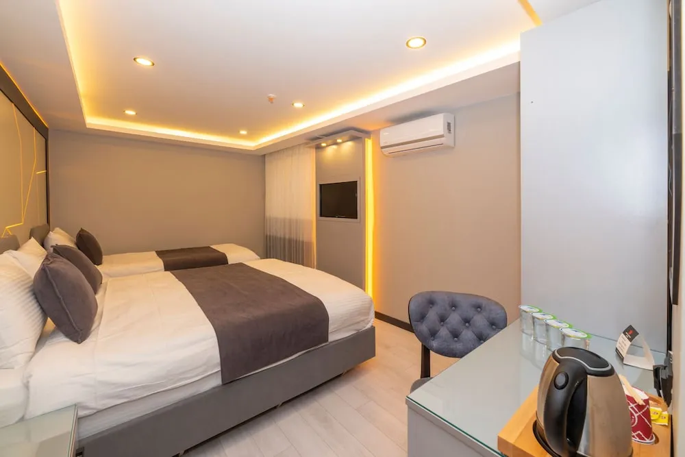 Deluxe Üç Kişilik Oda