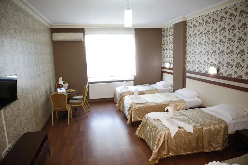 Deluxe Üç Kişilik Oda