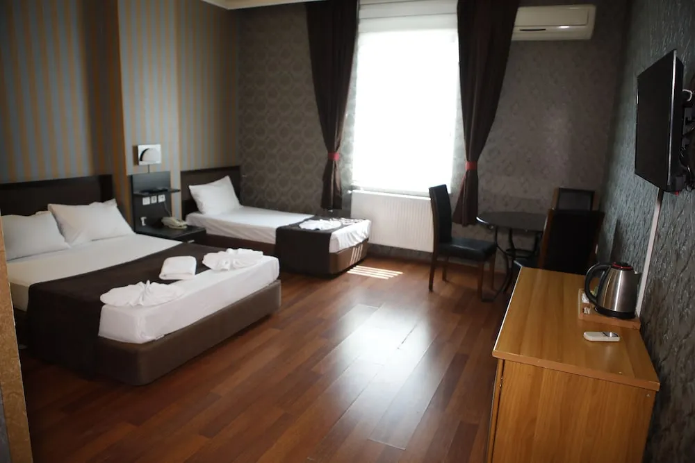 Deluxe Üç Kişilik Oda