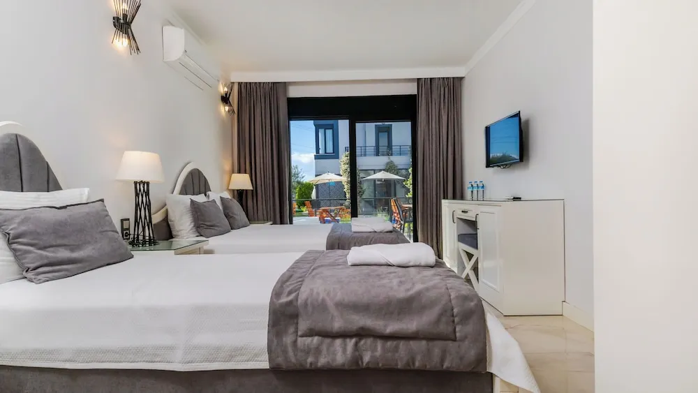 Deluxe Üç Kişilik Oda