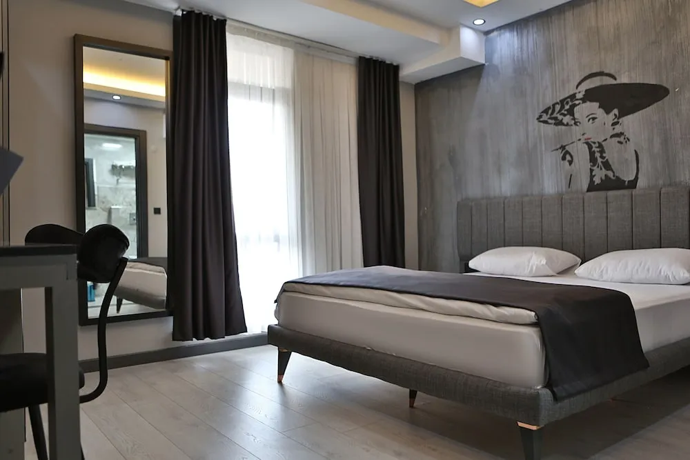 Deluxe Tek Büyük veya İki Ayrı Yataklı Oda
