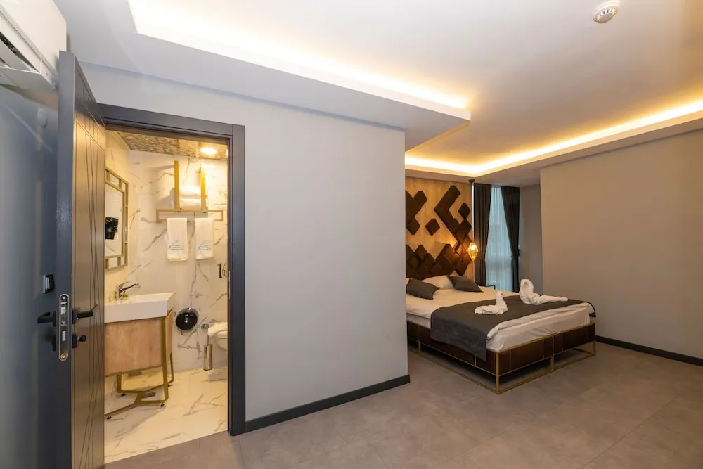Deluxe Tek Büyük veya İki Ayrı Yataklı Oda