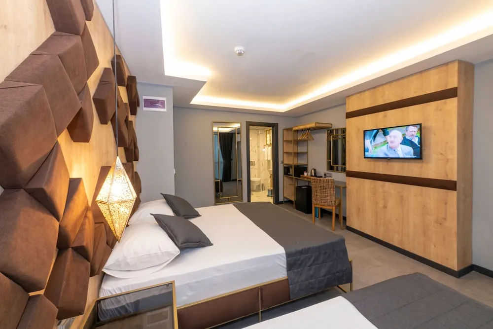 Deluxe Tek Büyük veya İki Ayrı Yataklı Oda