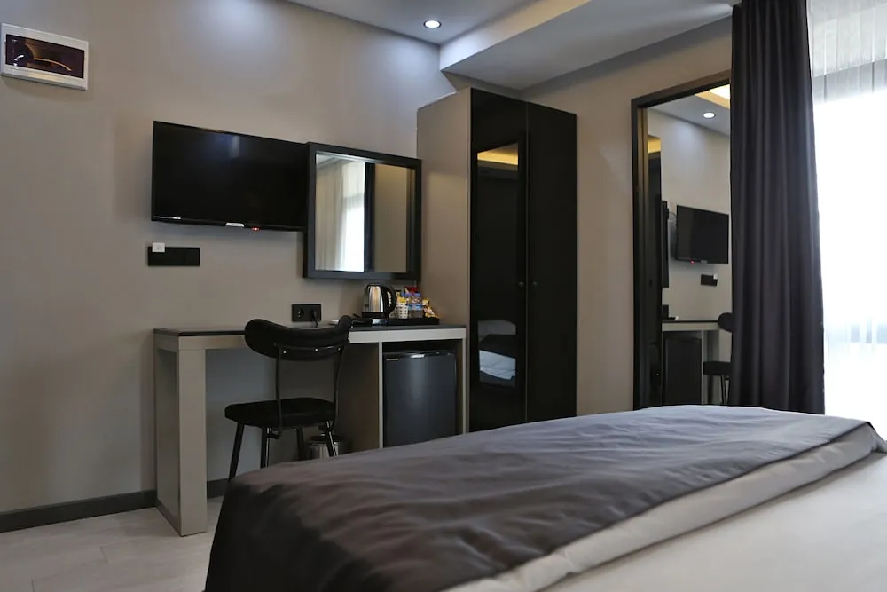 Deluxe Tek Büyük veya İki Ayrı Yataklı Oda