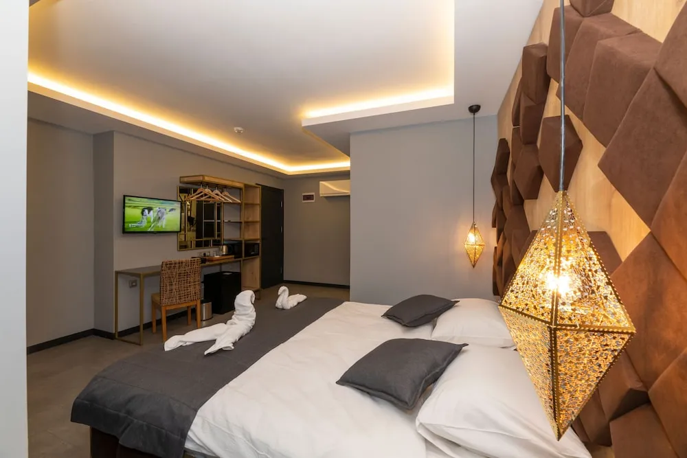 Deluxe Tek Büyük veya İki Ayrı Yataklı Oda