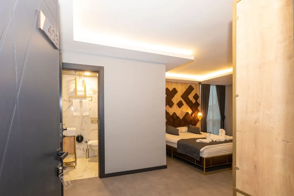 Deluxe Tek Büyük veya İki Ayrı Yataklı Oda
