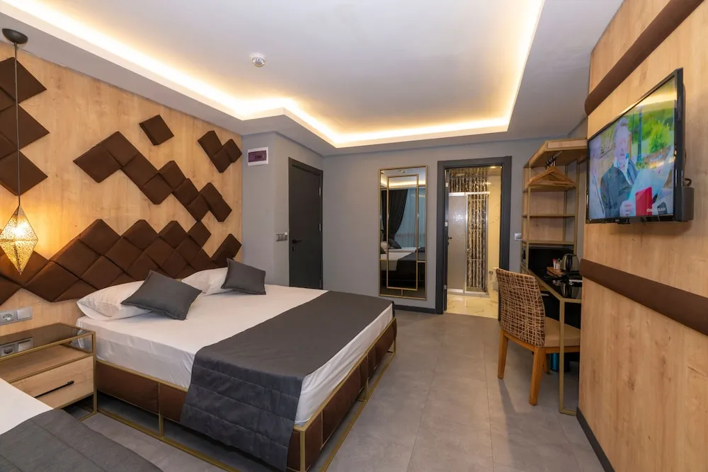Deluxe Üç Kişilik Oda