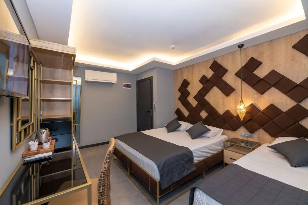 Deluxe Üç Kişilik Oda