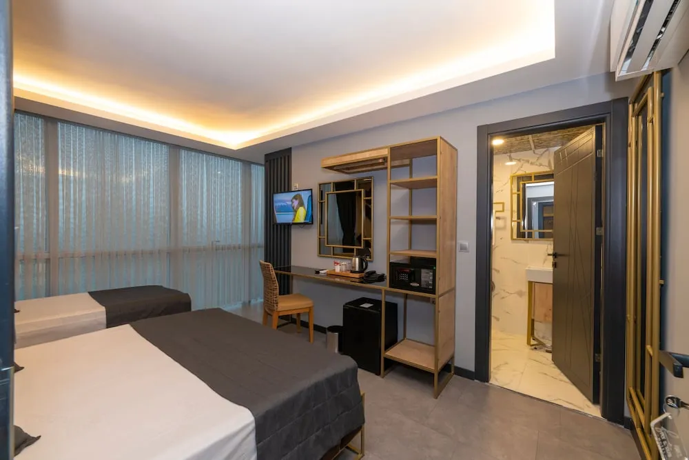 Deluxe Üç Kişilik Oda