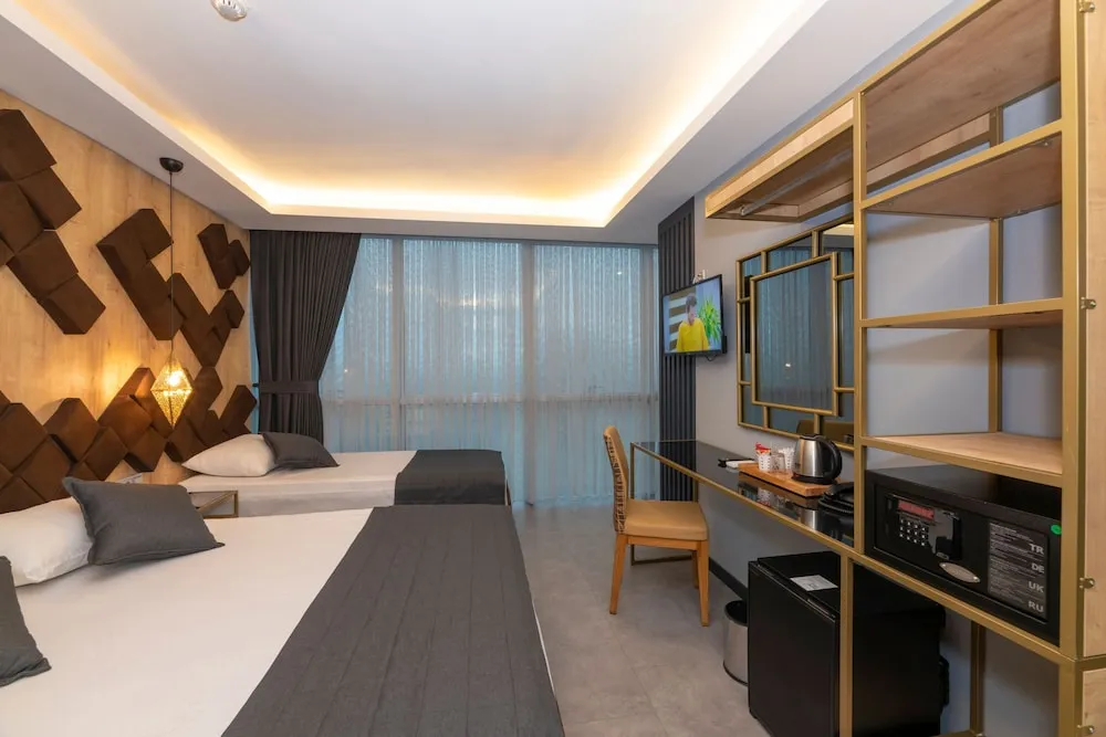 Deluxe Üç Kişilik Oda