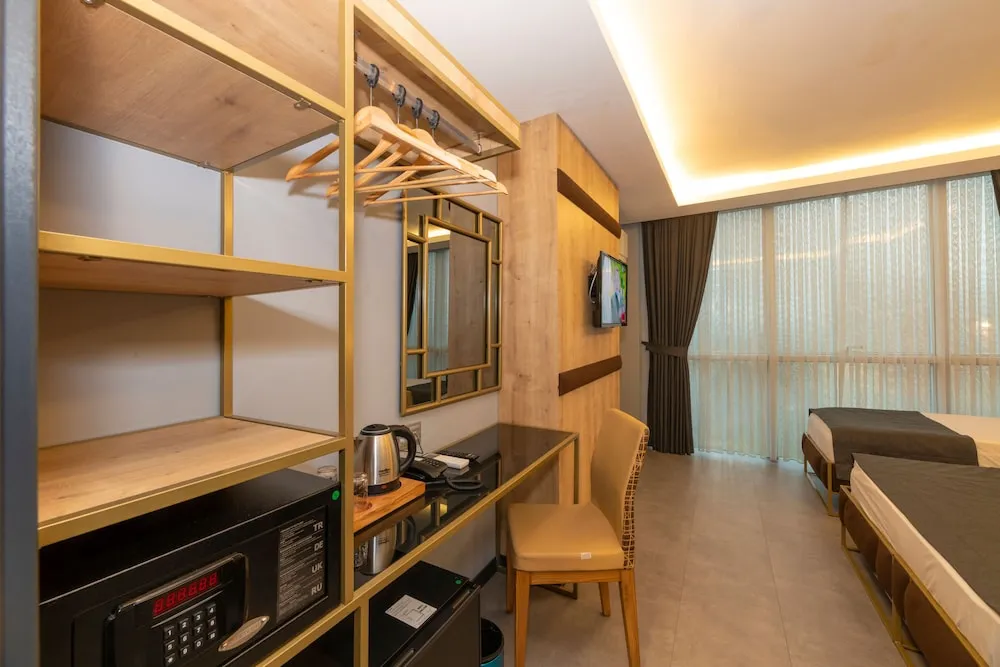 Deluxe Üç Kişilik Oda
