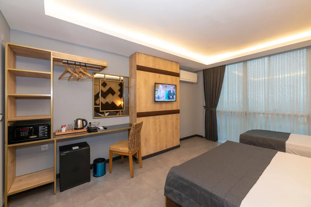 Deluxe Üç Kişilik Oda