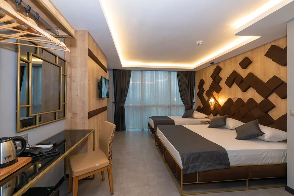Deluxe Üç Kişilik Oda