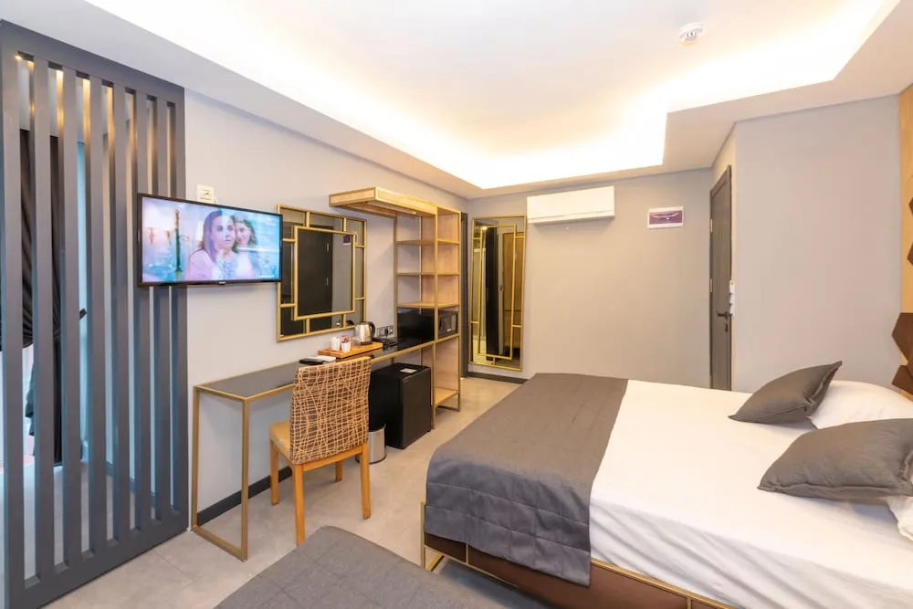 Deluxe Üç Kişilik Oda
