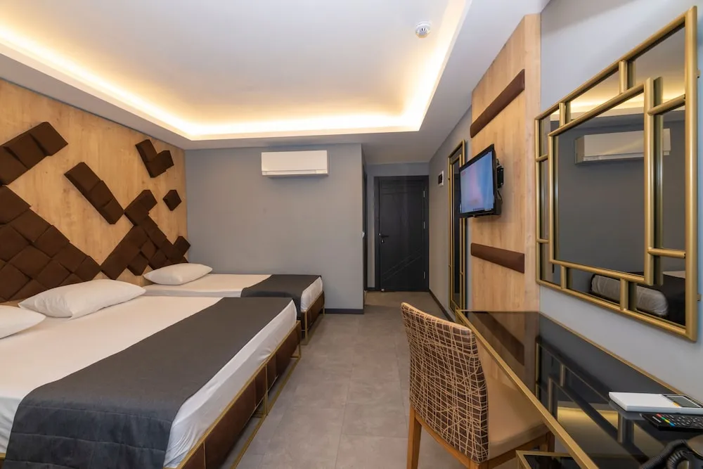 Deluxe Dört Kişilik Oda