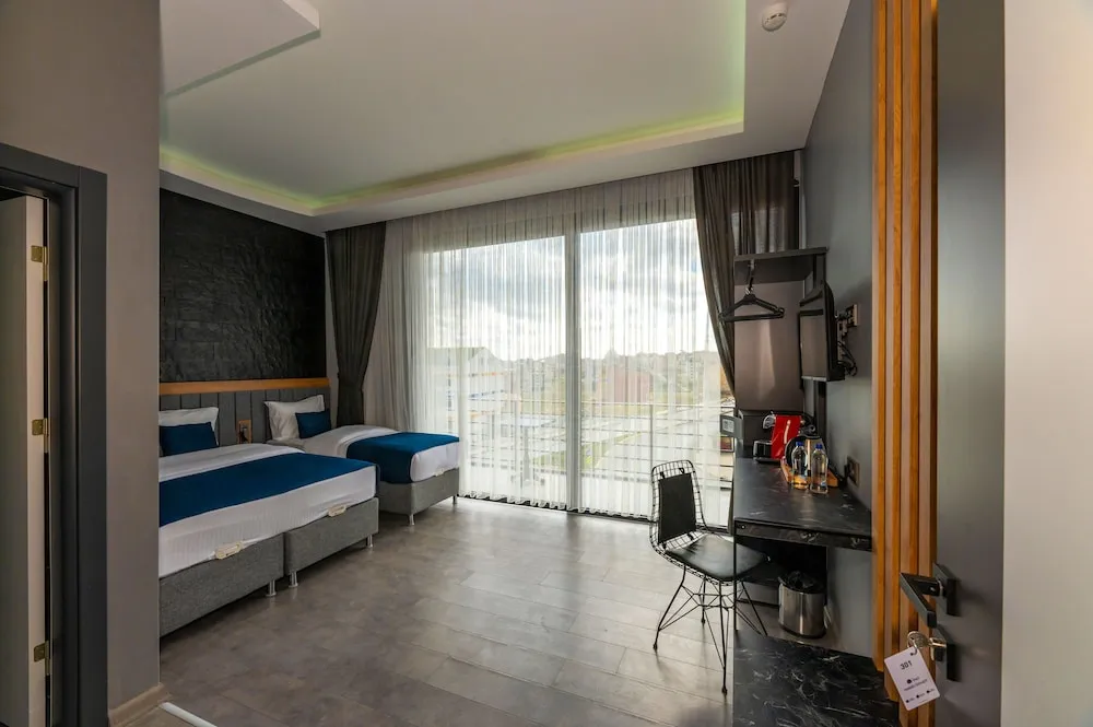 Deluxe Tek Büyük veya İki Ayrı Yataklı Oda, Balkon