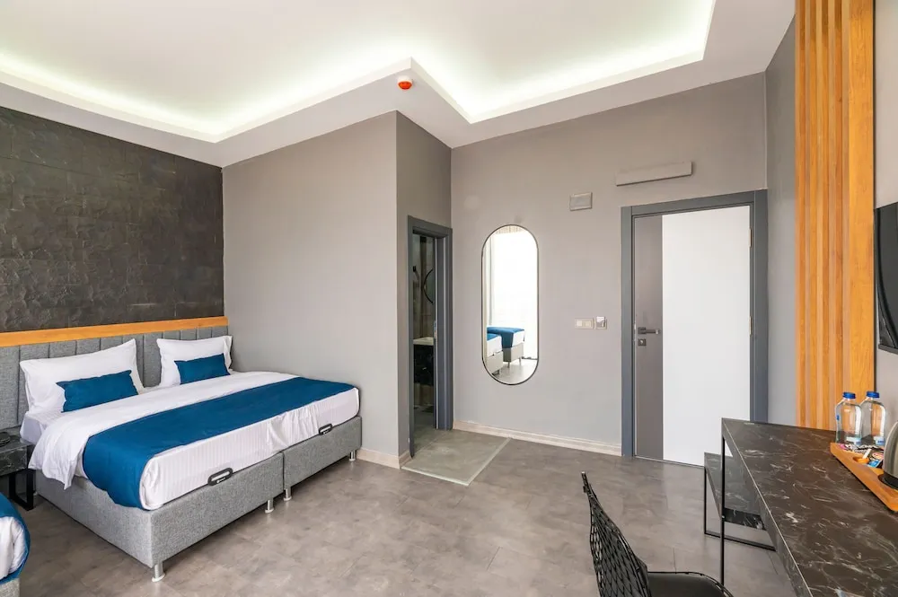 Deluxe Tek Büyük veya İki Ayrı Yataklı Oda, Balkon