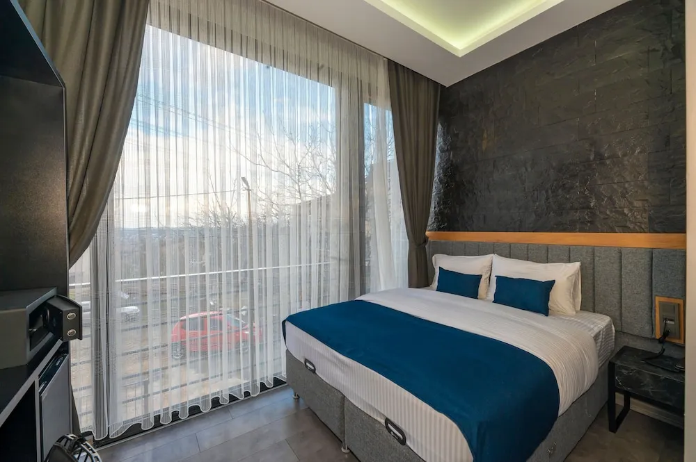 Deluxe Üç Kişilik Oda