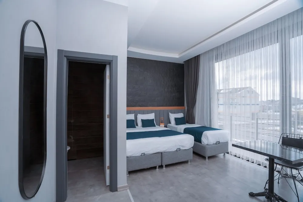 Deluxe Üç Kişilik Oda