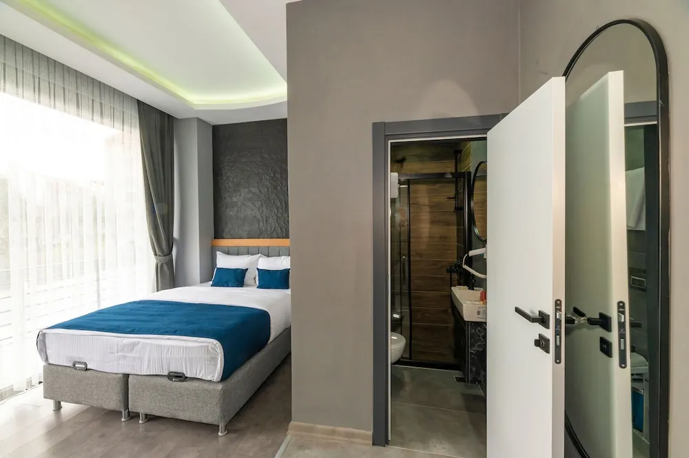 Deluxe Üç Kişilik Oda