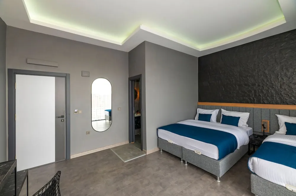 Deluxe Üç Kişilik Oda