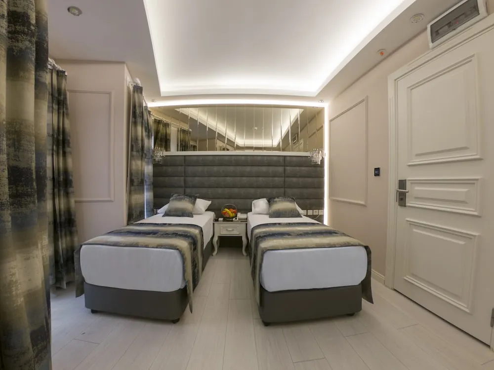 Comfort Tek Büyük veya İki Ayrı Yataklı Oda, Balkon