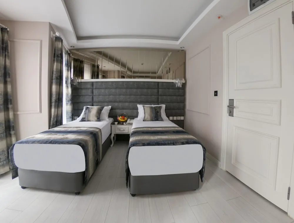 Comfort Tek Büyük veya İki Ayrı Yataklı Oda, Balkon