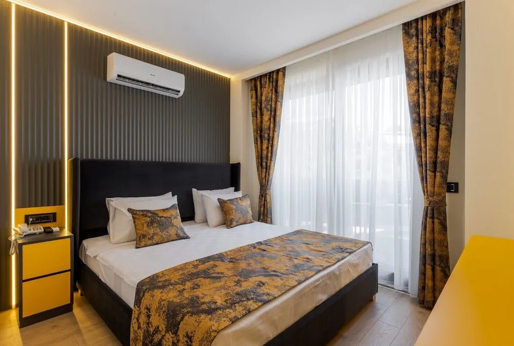 Deluxe Tek Büyük veya İki Ayrı Yataklı Oda