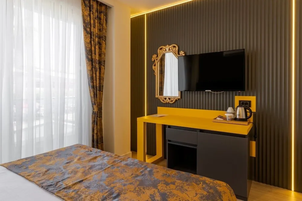 Deluxe Tek Büyük veya İki Ayrı Yataklı Oda