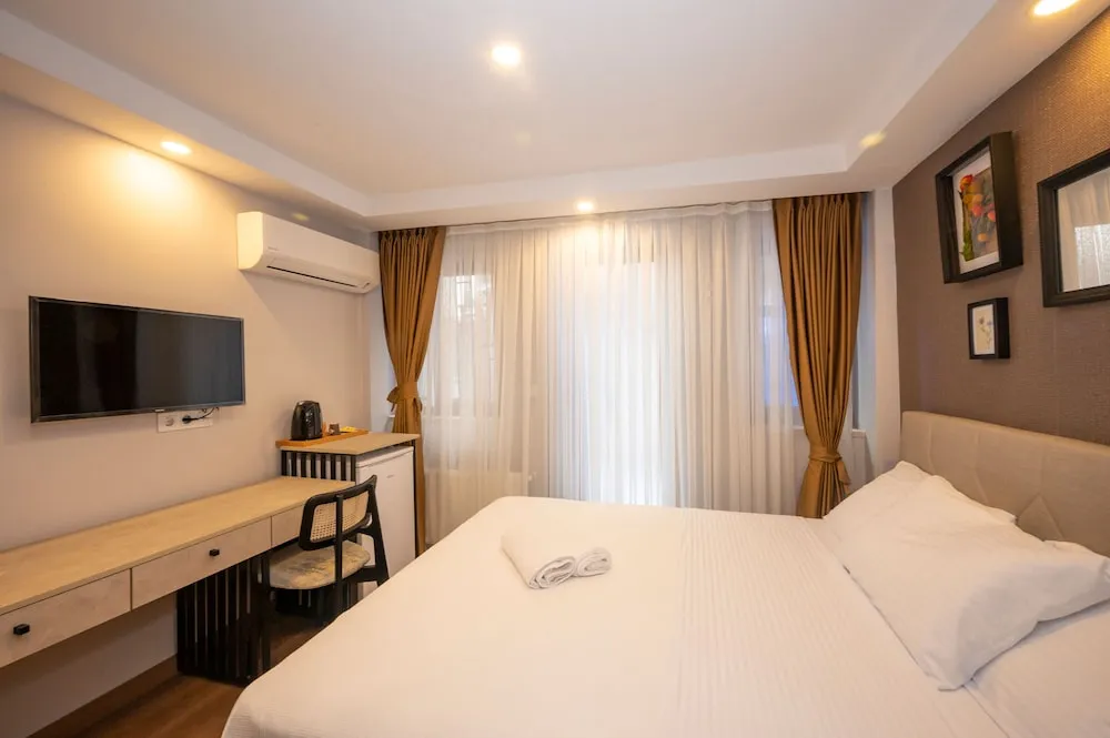 Deluxe Tek Büyük Yataklı Oda