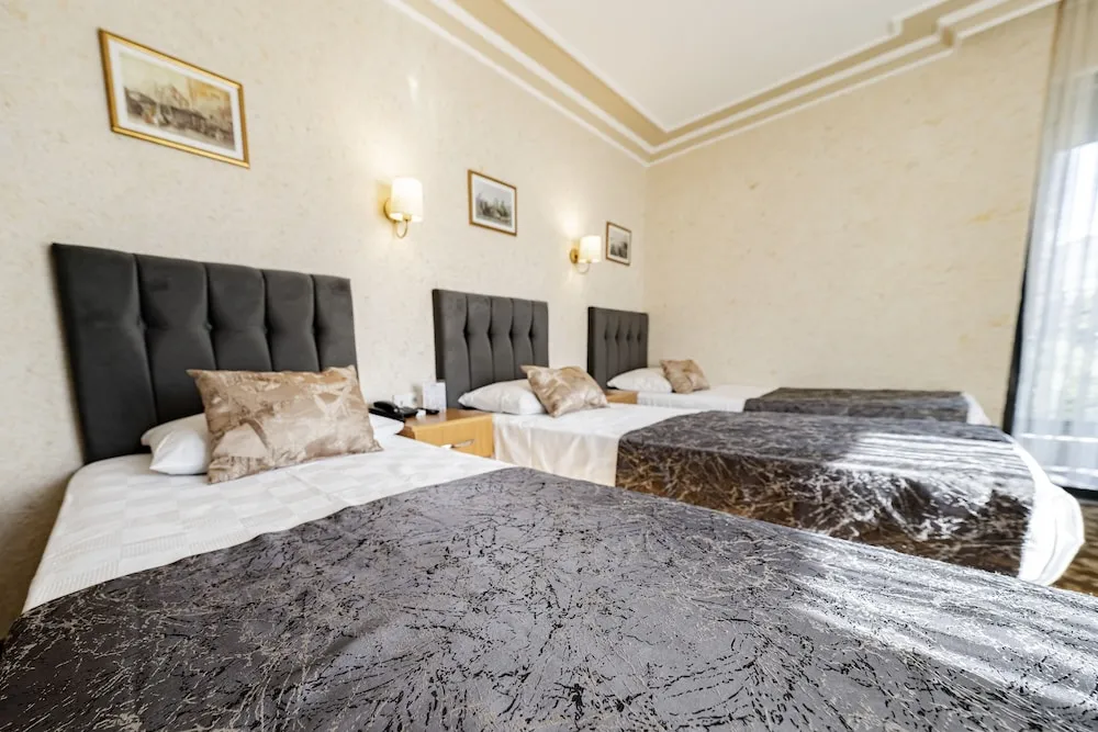 Standard Room - Trp Triple with City View and French Balcony