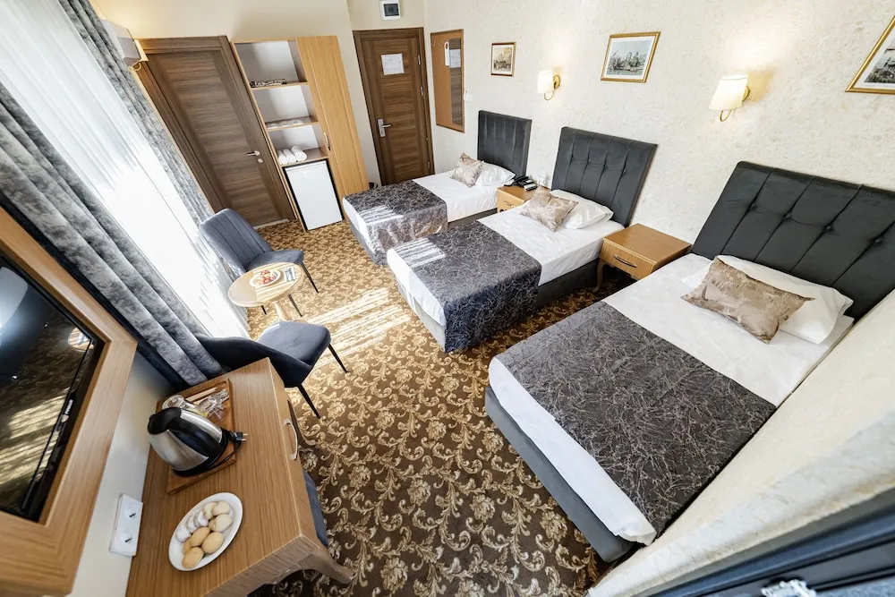 Standard Room - Trp Triple with City View and French Balcony