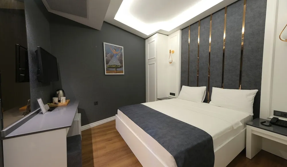 Economy Tek Büyük veya İki Ayrı Yataklı Oda