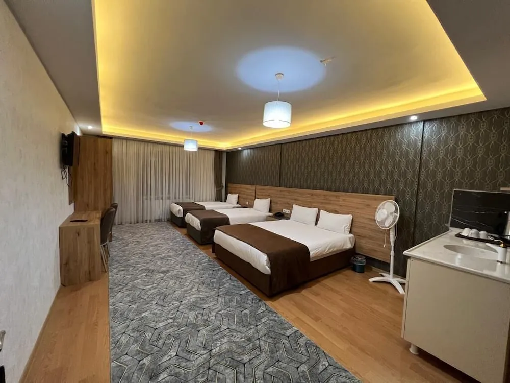 Deluxe Dört Kişilik Oda