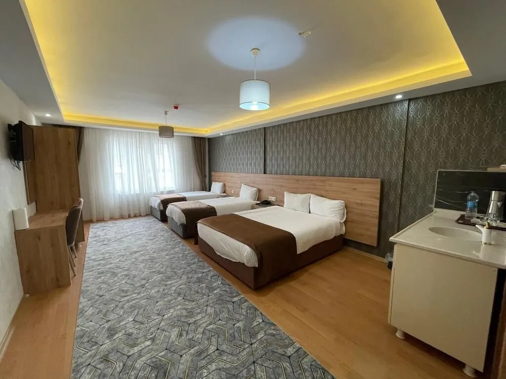 Deluxe Dört Kişilik Oda