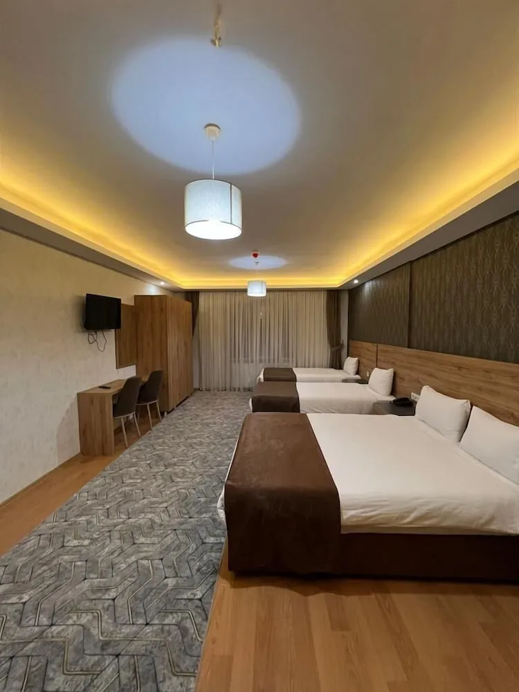 Deluxe Dört Kişilik Oda